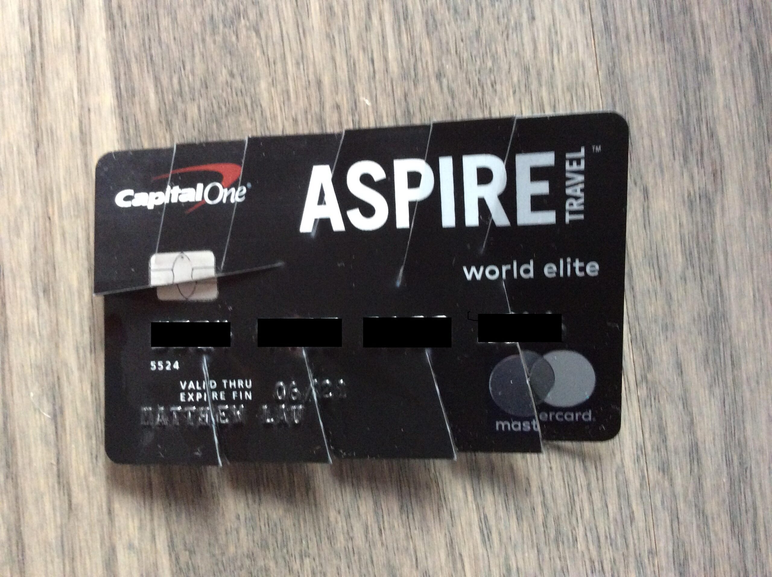 a black credit card with white text